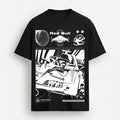 A black short-sleeve t-shirt with a large white graphic print featuring Red Bull Racing elements, including the Red Bull logo, a helmet, and a stylized race car illustration, displayed against a light gray background.