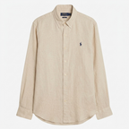 Vintage Ralph Lauren beige shirt with a logo on a white background